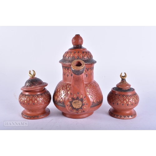 720 - A TURKISH TOPHANE POTTERY TEASET. Largest 17 cm high. (3)