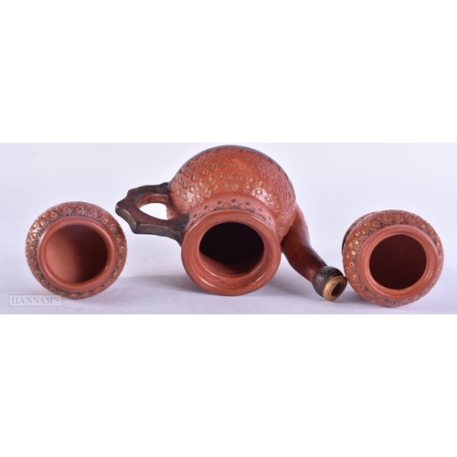 720 - A TURKISH TOPHANE POTTERY TEASET. Largest 17 cm high. (3)