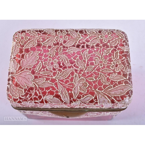 724 - AN ANTIQUE CRANBERRY GLASS ENAMELLED CASKET. 9.75 cm x 9 cm.