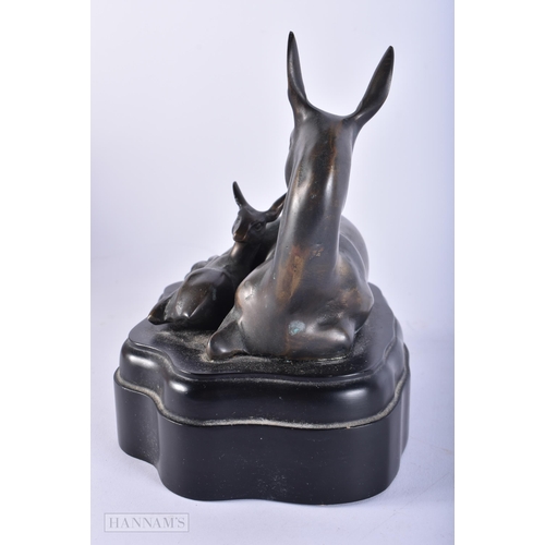 727 - A BRONZE DEER SCULPTURE. 18cm x 15cm.