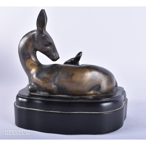 727 - A BRONZE DEER SCULPTURE. 18cm x 15cm.