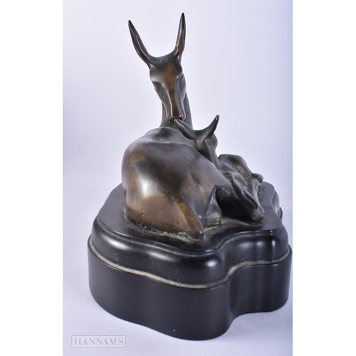 727 - A BRONZE DEER SCULPTURE. 18cm x 15cm.