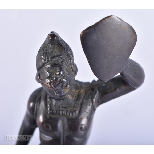 732 - A SMALL BRONZE FIGURE OF A ROMAN SOLDIER. 13 cm high.