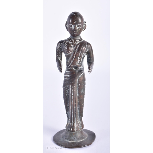 76 - AN EARLY INDIAN BRONZE FIGURE OF A HINDU DEITY. 14cm high.