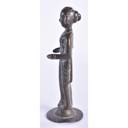 76 - AN EARLY INDIAN BRONZE FIGURE OF A HINDU DEITY. 14cm high.