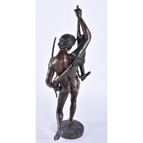 765 - AN ANTIQUE BRONZE FIGURE OF A HUNTER. 38cm high.