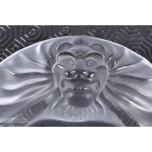 776 - A FRENCH LALIQUE GLASS LION DISH. 13 cm wide.