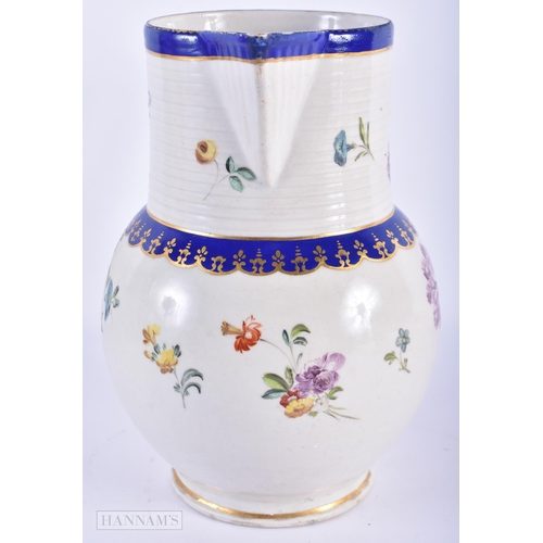 78 - A RARE LARGE 18TH CENTURY DERBY PORCELAIN JUG painted with flowers under a blue line banding. 22cm x... 