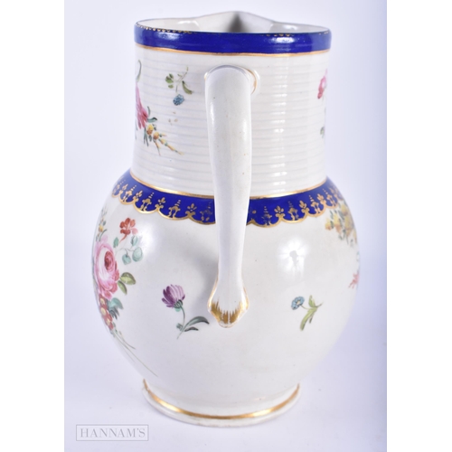 78 - A RARE LARGE 18TH CENTURY DERBY PORCELAIN JUG painted with flowers under a blue line banding. 22cm x... 