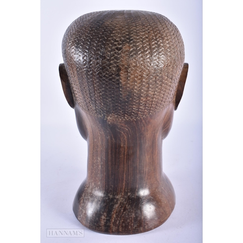 80 - A LOVELY AFRICAN CARVED LIGNUM VITAE BUST OF A MALE. 23 cm x 12 cm.