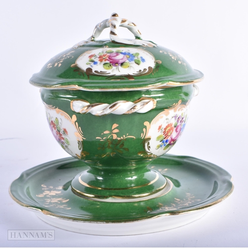 98 - A FRENCH PORCELAIN SEVRES STYLE PORCELAIN ECUELLE AND COVER painted with flowers. 17 cm wide.