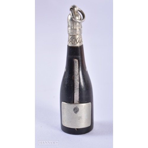 1276 - A VINTAGE CHAMPAGNE BOTTLE CIGAR CUTTER. 10.3 grams. 5.5 cm x 1.5 cm.