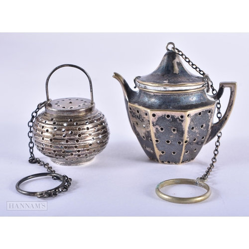 1282 - TWO SILVER TEA INFUSERS. 29.3 grams. Largest 5.25 cm x 5.5 cm. (2)