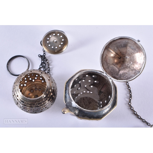 1282 - TWO SILVER TEA INFUSERS. 29.3 grams. Largest 5.25 cm x 5.5 cm. (2)