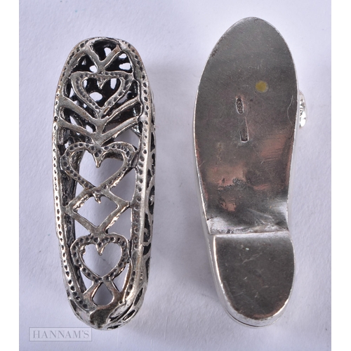 1287 - TWO SILVER SHOES. 18 grams. 1.5 cm x 4.25 cm. (2)