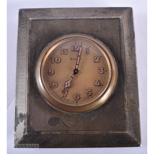 1291 - A SILVER DESK CLOCK. Not running. 202.5 grams overall. 7.5 cm x 9 cm.