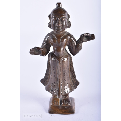 1587 - AN ANTIQUE INDIAN BRONZE FIGURE. 11cm high.