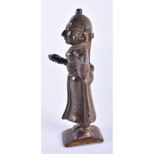 1587 - AN ANTIQUE INDIAN BRONZE FIGURE. 11cm high.