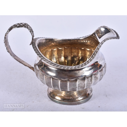 1943 - A REGENCY SILVER CREAM JUG. London 1830. 142 grams. 13.75 cm x 9.5 cm.