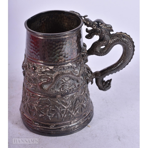 1947 - AN ANTIQUE CHINESE EXPORT SILVER DRAGON MUG. 139.4 grams. 10 cm x 9 cm.