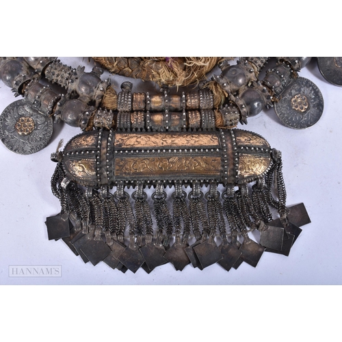 1948 - A FINE OMANI SILVER AND YELLOW METAL TRIBAL NECKLACE inset with multiple coins. 1170 grams overall. ... 