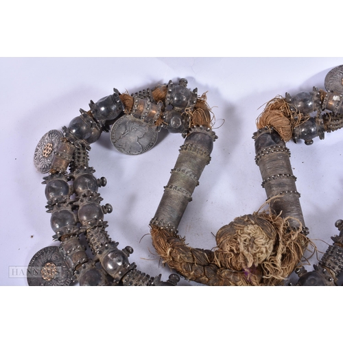 1948 - A FINE OMANI SILVER AND YELLOW METAL TRIBAL NECKLACE inset with multiple coins. 1170 grams overall. ... 