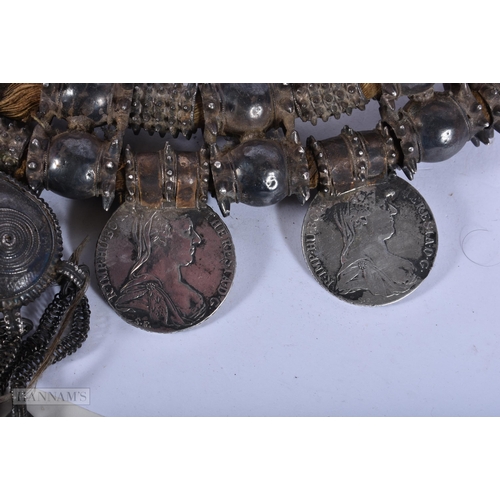 1948 - A FINE OMANI SILVER AND YELLOW METAL TRIBAL NECKLACE inset with multiple coins. 1170 grams overall. ... 