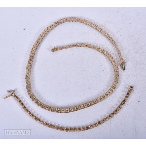 1964 - A LOVELY 9CT GOLD AND DIAMOND NECKLACE with matching bracelet. 36 grams. Necklace 45cm long, bracele... 