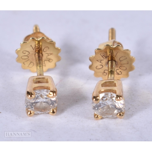 1965 - A PAIR OF 18CT GOLD 0.5 CT DIAMOND EARRINGS. 1.4 grams. 0.4 cm x 0.4 cm.