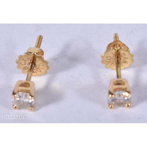 1965 - A PAIR OF 18CT GOLD 0.5 CT DIAMOND EARRINGS. 1.4 grams. 0.4 cm x 0.4 cm.