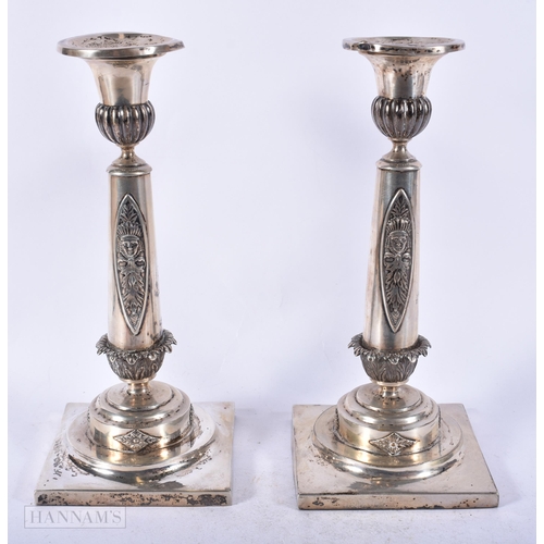 1969 - A PAIR OF ANTIQUE CONTINENTAL SILVER CANDLESTICKS. 1014 grams overall. 22cm high.