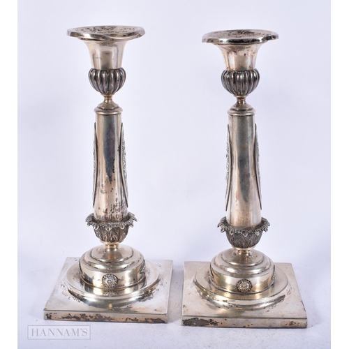 1969 - A PAIR OF ANTIQUE CONTINENTAL SILVER CANDLESTICKS. 1014 grams overall. 22cm high.