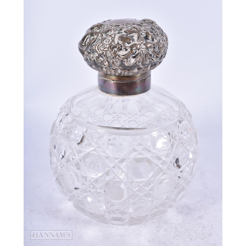 1974 - A VICTORIAN SILVER TOPPED GLASS SCENT BOTTLE. Birmingham 1899. 485 grams inc glass. 12.75 cm high.