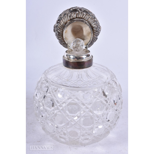 1974 - A VICTORIAN SILVER TOPPED GLASS SCENT BOTTLE. Birmingham 1899. 485 grams inc glass. 12.75 cm high.