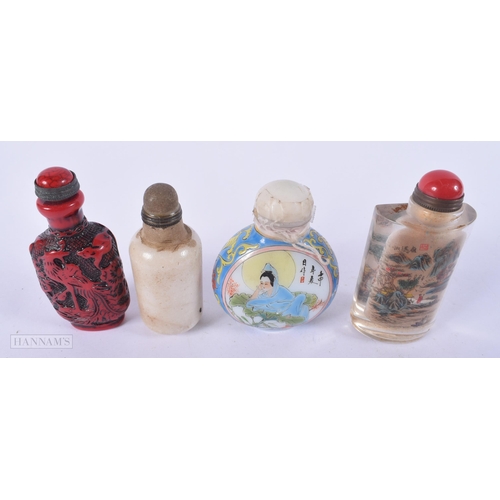 2661 - FOUR CHINESE SNUFF BOTTLES. Largest 8.5 cm high. (4)