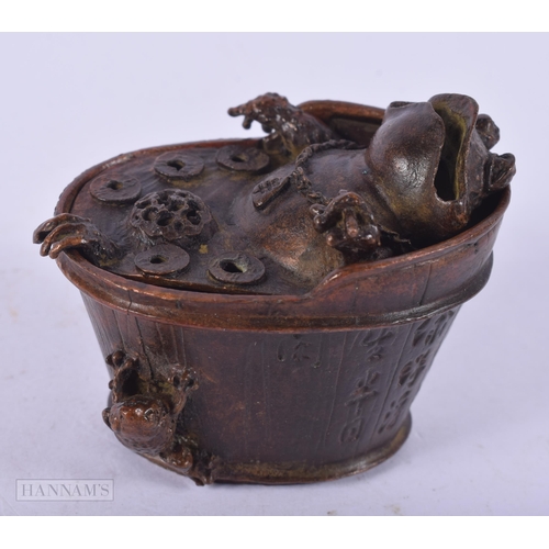 2663 - A JAPANESE BRONZE FROG IN BATH OKIMONO. 207 grams. 6 cm x 6.75 cm.