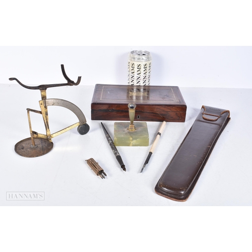 3010 - A boxed case of drawing instruments together with a brass sewing Etui, set of scales and an onyx pen... 