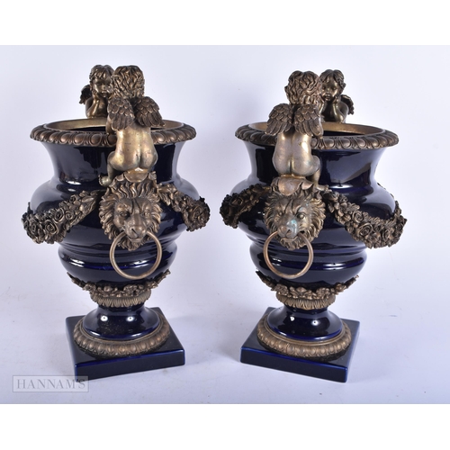 4124 - A LARGE PAIR OF CONTINENTAL BRONZE MOUNTED PORCELAIN VASES. 36 cm x 24 cm.