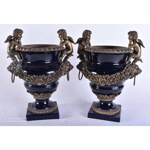 4124 - A LARGE PAIR OF CONTINENTAL BRONZE MOUNTED PORCELAIN VASES. 36 cm x 24 cm.