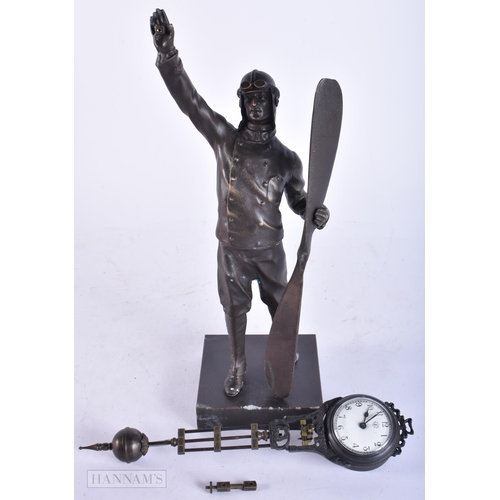 4128 - A BRONZE PILOT MYSTERY CLOCK. 30 cm high.  Untested