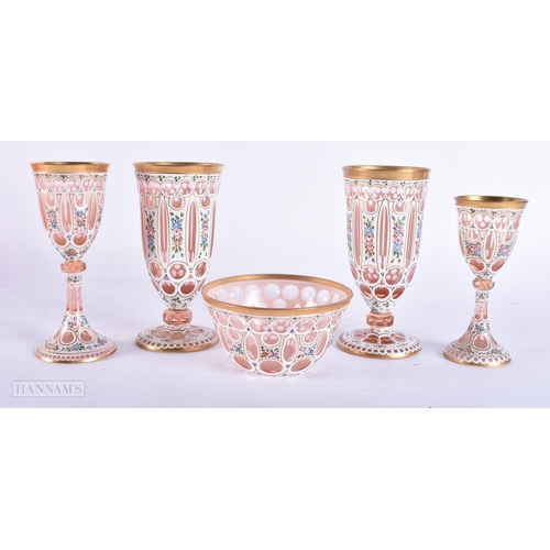 4131 - A SET OF FIVE LATE 19TH CENTURY BOHEMIAN GLASSES. Largest 15cm high. (5)