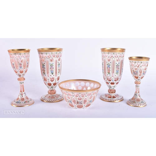 4131 - A SET OF FIVE LATE 19TH CENTURY BOHEMIAN GLASSES. Largest 15cm high. (5)