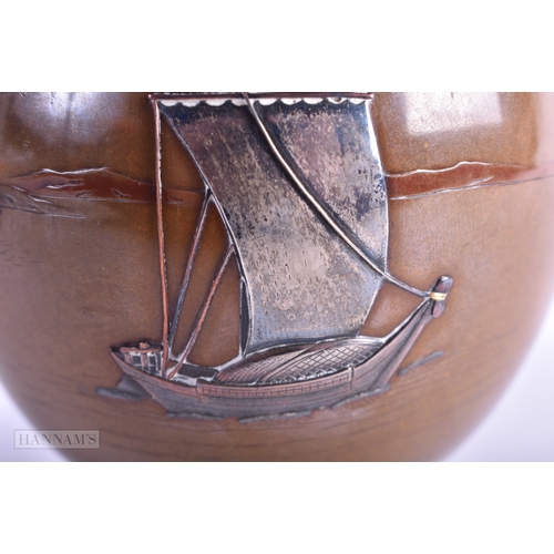 100 - A LOVELY 19TH CENTURY JAPANESE MEIJI PERIOD BRONZE SILVER SHIBUICHI VASE decorated with a boat at fu... 