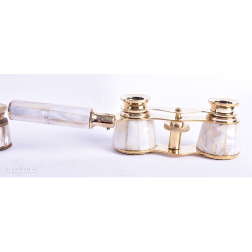 113 - A GROUP OF FOUR MOTHER OF PEARL OPERA GLASSES. Largest 18 cm wide extended. (4)