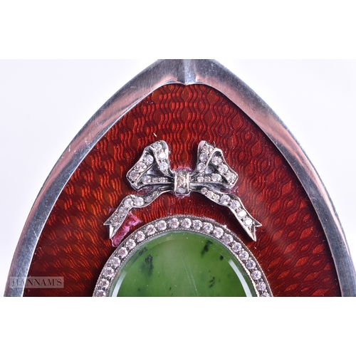 117 - A FINE PAIR OF RUSSIAN SILVER AND ENAMEL PHOTOGRAPH FRAMES with nephrite jade backings, the fronts d... 