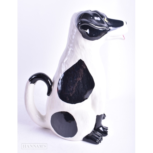 128 - A LIBERTY OF LONDON CERAMIC DOG JUG together with a retro ashtray and an onyx lighter. Largest 28 cm... 