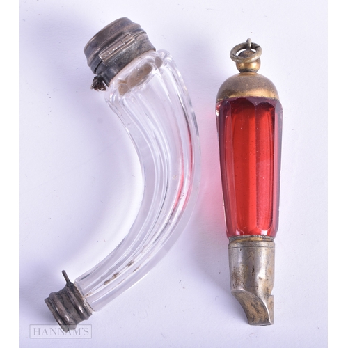 142 - AN EARLY VICTORIAN CORNUCOPIA GLASS SCENT BOTTLE together with a ruby glass whistle. Largest 8 cm x ... 