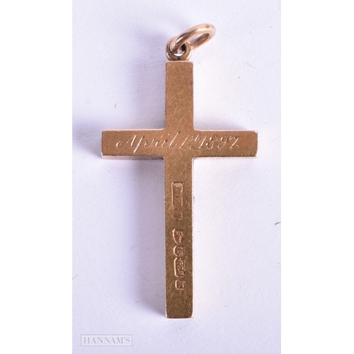 144 - A 15CT GOLD CRUCIFIX together with a 9ct gold tag chain. 15ct 2.9 grams, 9ct 4.8 grams. Largest 19 c... 