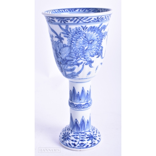 15 - A 17TH CENTURY CHINESE BLUE AND WHITE PORCELAIN GOBLET Kangxi, painted with flowers and vines. 15.5 ... 