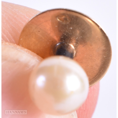 153 - A SET OF ANTIQUE GOLD AND PEARL DRESS STUDS. 5.2 grams. 1 cm diameter.